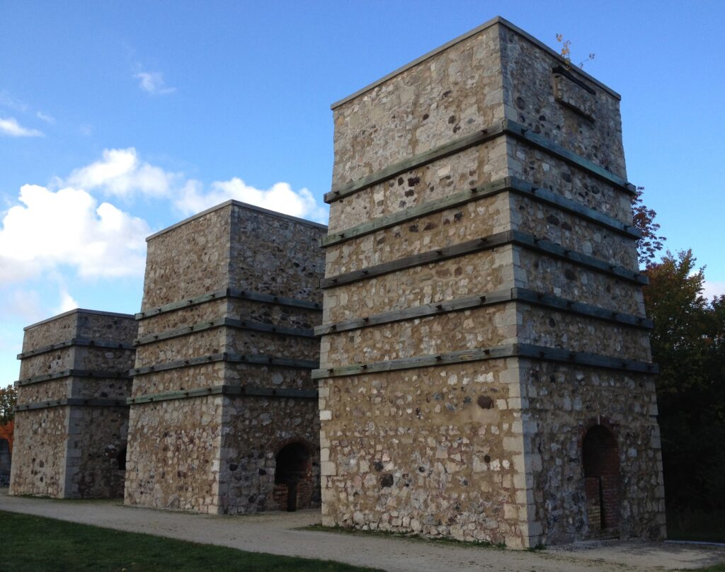 Lime Kiln Park is a 28-acre community park located in Grafton, Wisconsin, along the scenic Milwaukee River. The park features historic lime kilns dating back to the 1890s, showcasing the area's industrial heritage of limestone production.